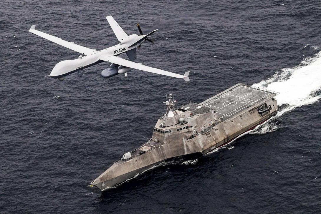 An MQ-9 Sea Guardian unmanned maritime surveillance aircraft system flies over the littoral combat ship USS Coronado in the Pacific Ocean in April, 2021, during U.S. Pacific Fleet's Unmanned Systems Integrated Battle Problem 21. At a recent conference, the fleet commander emphasized the need for trusted relationships and information sharing with allies and for long-range strike weapons. 