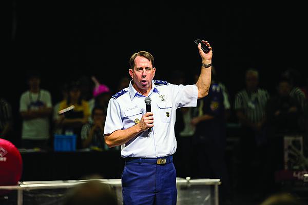 Maj. Gen. Jack Shanahan, USAF, commander, U.S. Air Force ISR Agency, extols the virtues and necessity of technology education to high school students at the Alamo First Robotics Competition.
