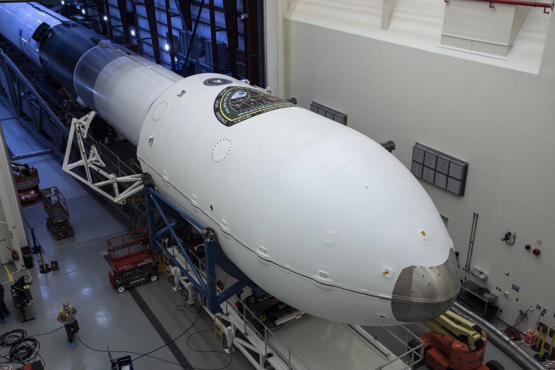 The payload faring, which contains the military's GPS III SV 03 satellite system, is connected to Space X's Falcon 9 rocket in preparation for a June 30 launch from Cape Canaveral Air Force station. Credit: Space X