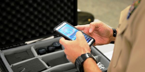 Marines conduct civil-military operations and collect, process, analyze and share information using software from a smartphone.