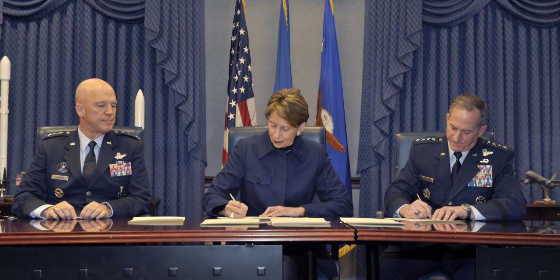 The U.S. Space Force will grow to about 16,000 warfighters, civilians and contractors. Top military leaders, including, Gen. John Raymond (l), commander of United States Space Command and Air Force Space Command; Secretary of the Air Force Barbara Barrett (c); and previous Chief of Staff of the Air Force Gen. David L. Goldfein, sign memorandums to authorize the service last December. Credit: Secretary of the Air Force Public Affairs, Photo by Tech. Sgt. Robert Barnett