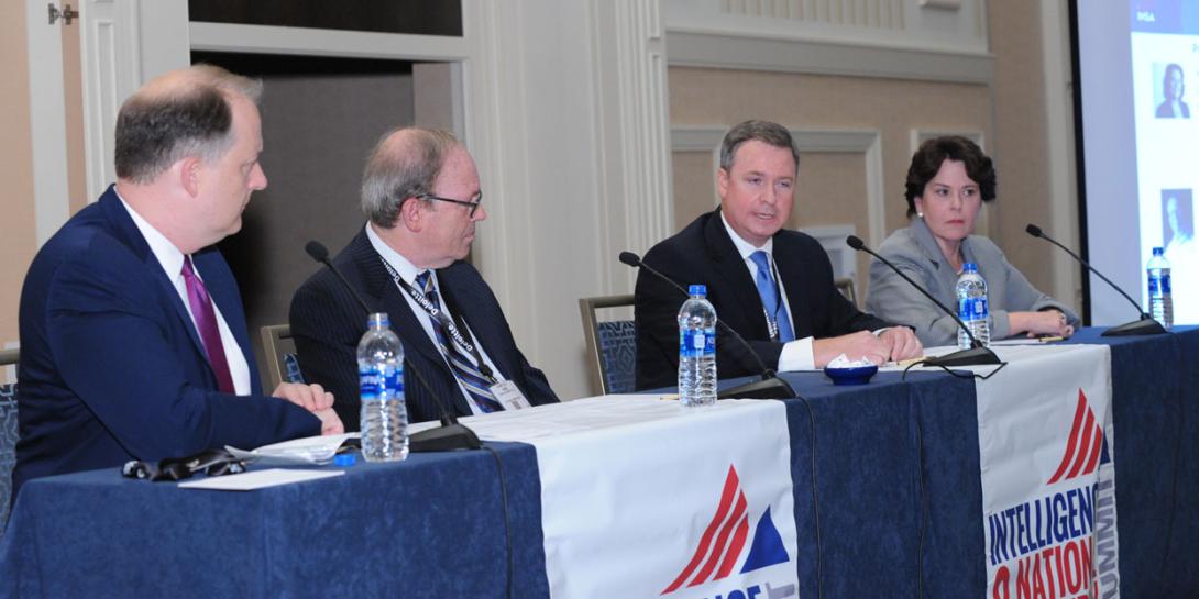 Panelists discussing the effect of influence operations on the United States are (l-r) panel moderator Shane Harris of The Washington Post; Ronald Waltzman, The Rand Corporation; Joe Morosco, ODNI; and Fran Moore, Financial Systemic Analysis and Resilience Center. Photography by Herman Farrer