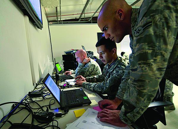 A U.S. Air Force airman reviews operations during a Combined Endeavor exercise in Grafenwoehr, Germany. The first phase of JIE implementation produced many advances being incorporated at U.S. facilities throughout the world.
